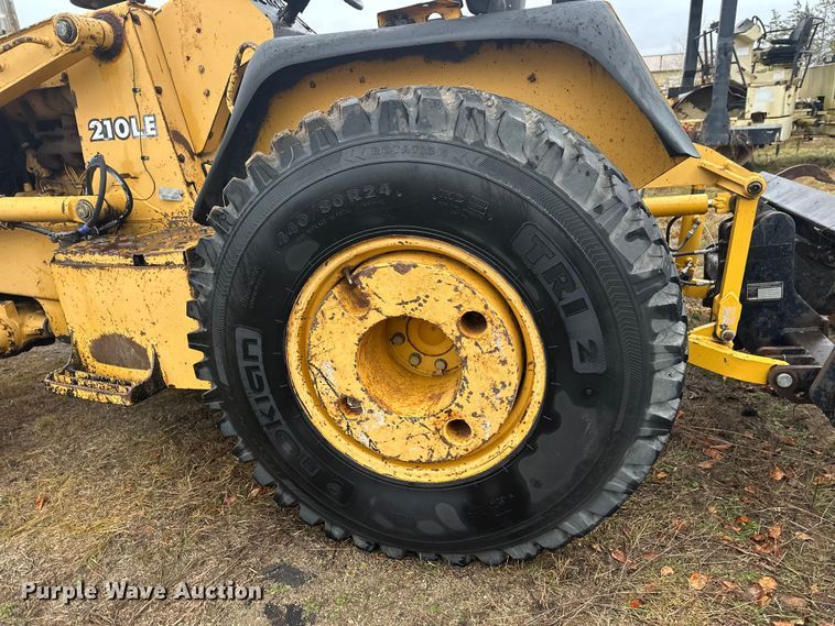 image for item DW4383 1998 John Deere 210LE landscape tractor