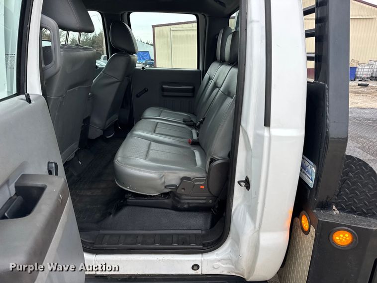 image for item DW6706 2016 Ford F550 Super Duty XL Crew Cab flatbed truck