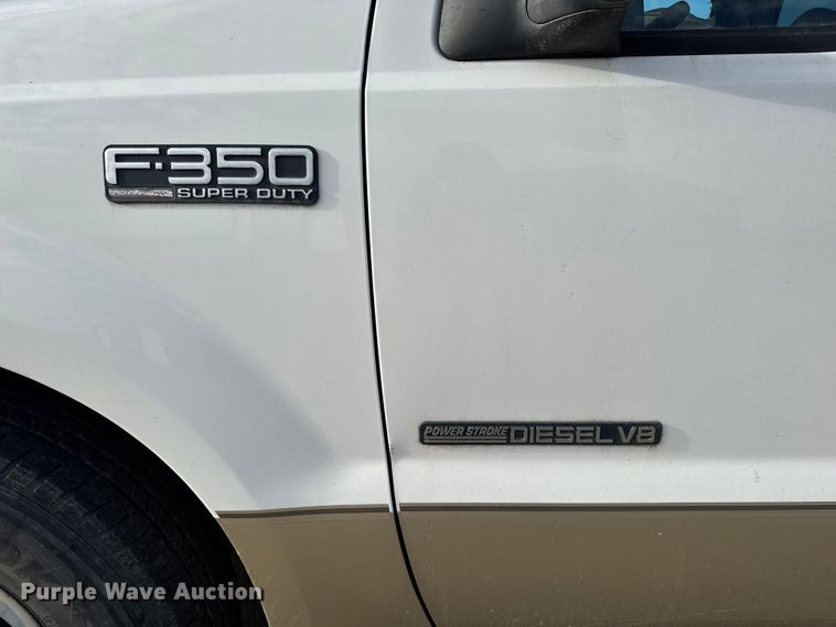 image for item EA2074 2001 Ford F350 Super Duty Crew Cab flatbed pickup truck