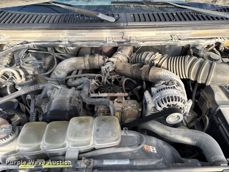 image for item EA2074 2001 Ford F350 Super Duty Crew Cab flatbed pickup truck