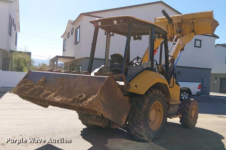 image for item EE5015 2020 Caterpillar 415F2IL landscape tractor