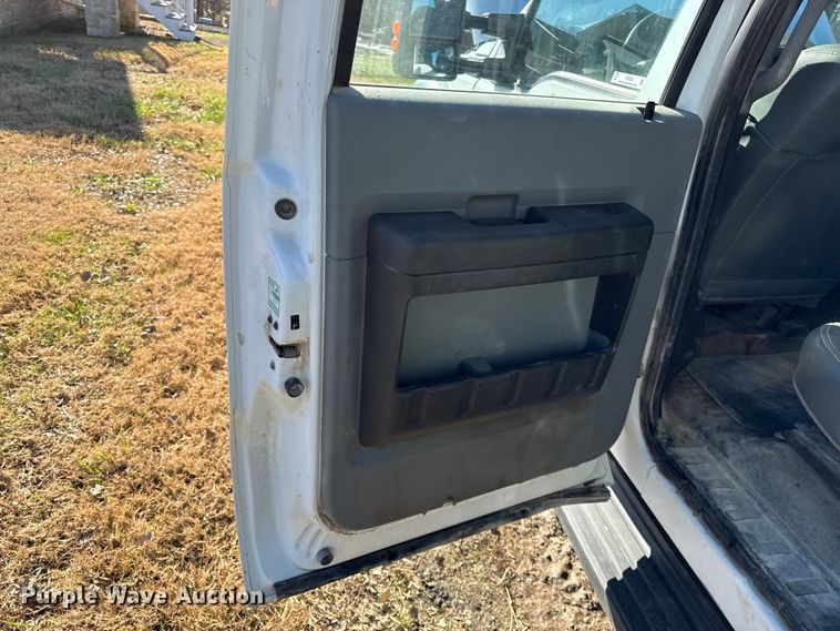 image for item EN0093 2015 Ford F550 Crew Cab dump truck