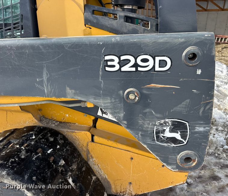 image for item EN0746 2012 John Deere 329D skid steer loader