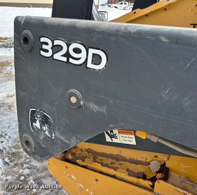 image for item EN0746 2012 John Deere 329D skid steer loader