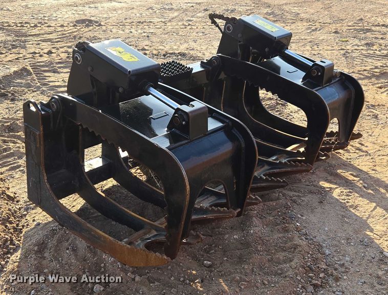 image for item ET5376 Caterpillar 296-9300 Rake with clamp skid steer grapple bucket