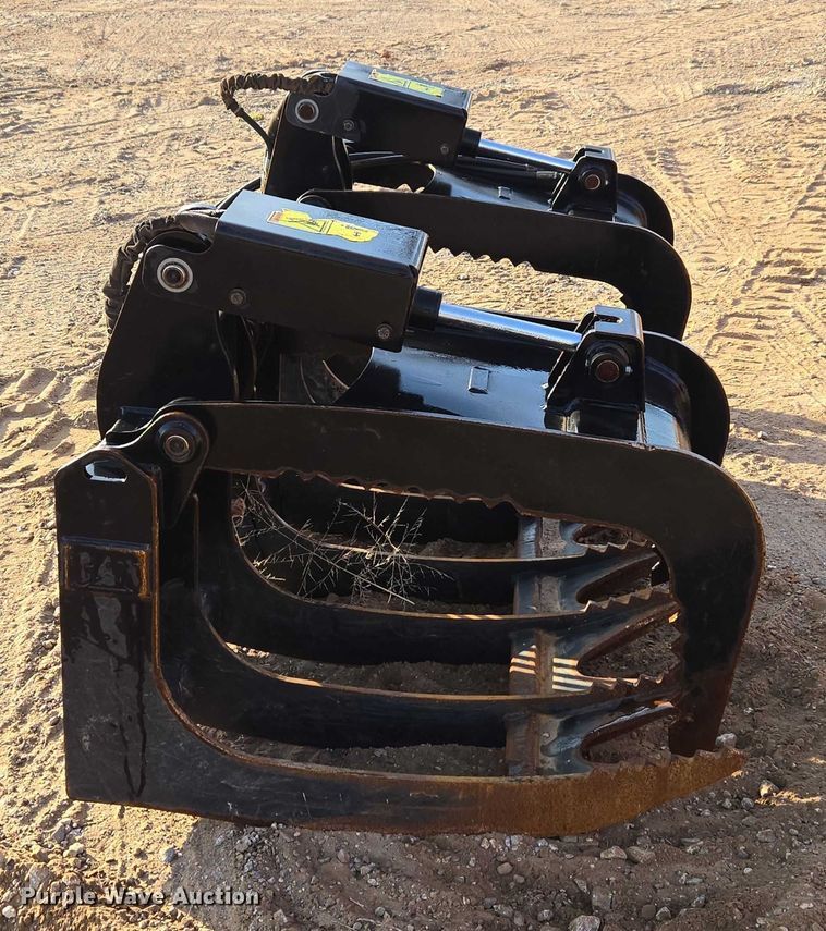 image for item ET5376 Caterpillar 296-9300 Rake with clamp skid steer grapple bucket