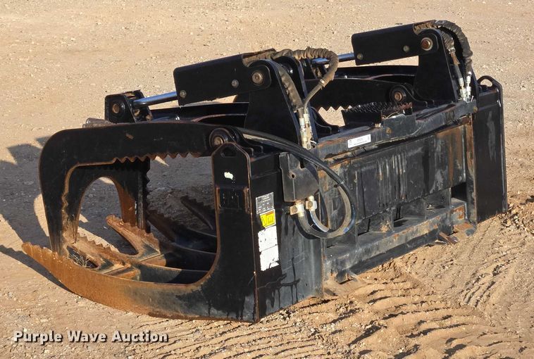 image for item ET5376 Caterpillar 296-9300 Rake with clamp skid steer grapple bucket