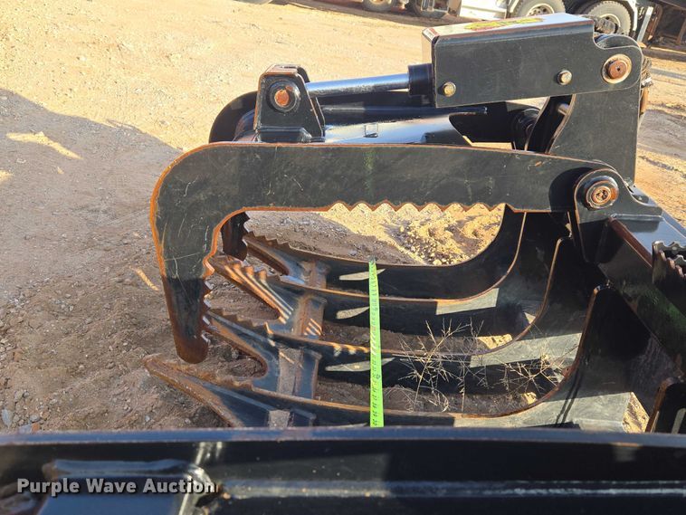 image for item ET5376 Caterpillar 296-9300 Rake with clamp skid steer grapple bucket