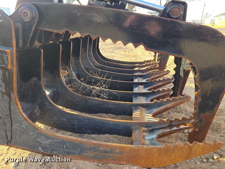 image for item ET5376 Caterpillar 296-9300 Rake with clamp skid steer grapple bucket