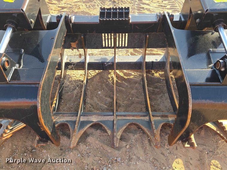 image for item ET5376 Caterpillar 296-9300 Rake with clamp skid steer grapple bucket