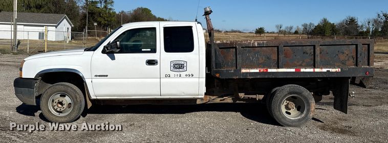 image for item EU5492 2004 Chevrolet Silverado 3500 Ext. Cab dump flatbed pickup truck