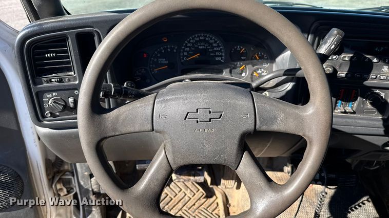 image for item EU5492 2004 Chevrolet Silverado 3500 Ext. Cab dump flatbed pickup truck