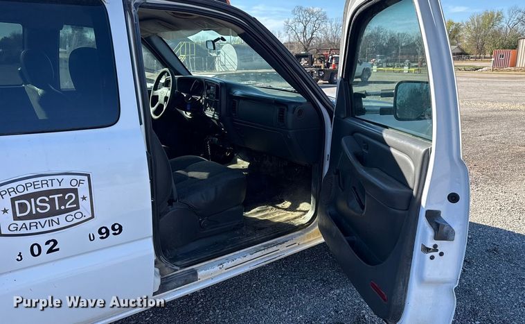 image for item EU5492 2004 Chevrolet Silverado 3500 Ext. Cab dump flatbed pickup truck