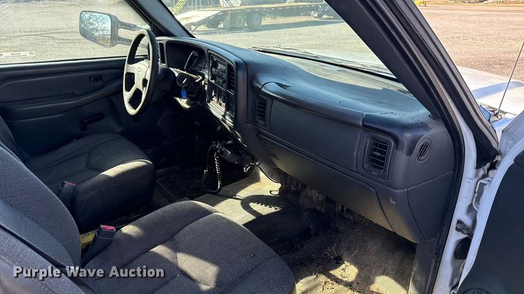 image for item EU5492 2004 Chevrolet Silverado 3500 Ext. Cab dump flatbed pickup truck