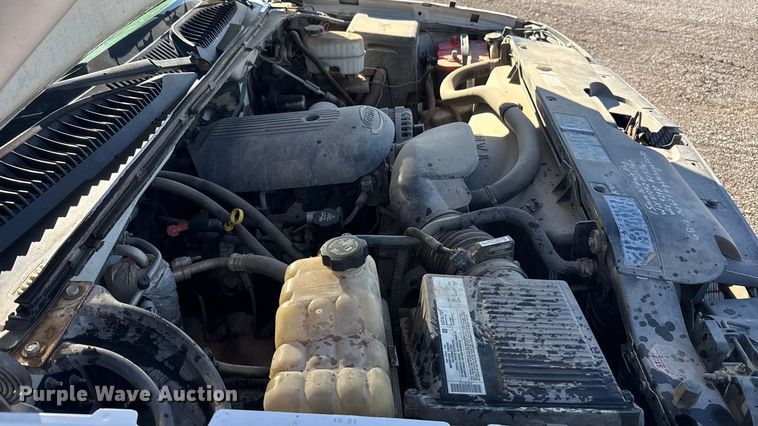 image for item EU5492 2004 Chevrolet Silverado 3500 Ext. Cab dump flatbed pickup truck