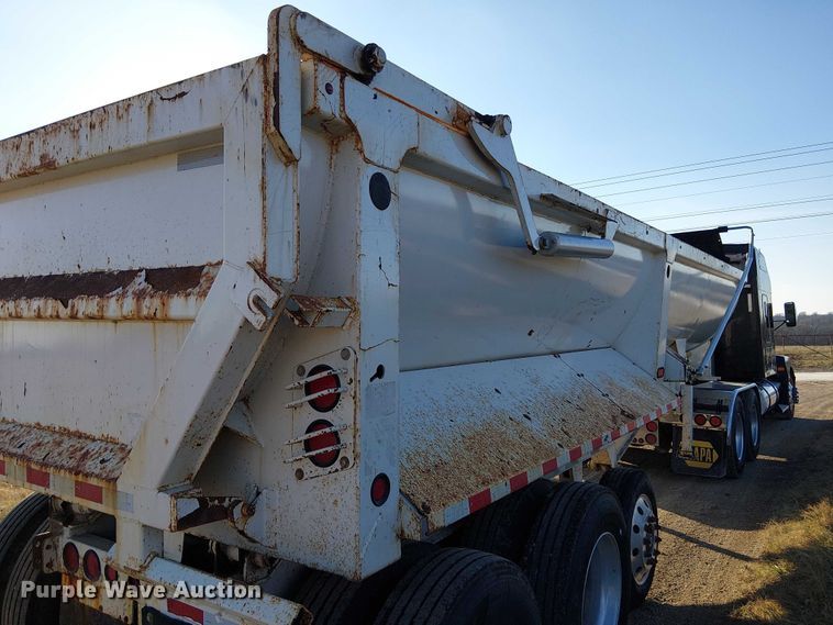 image for item FK0860 2021 Construction Trailer Specialists HRD 28 QF TRI end dump trailer