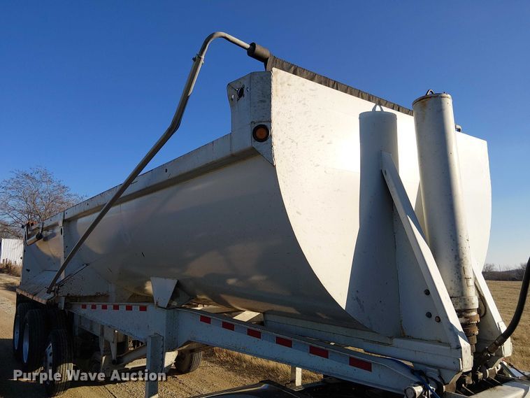 image for item FK0860 2021 Construction Trailer Specialists HRD 28 QF TRI end dump trailer