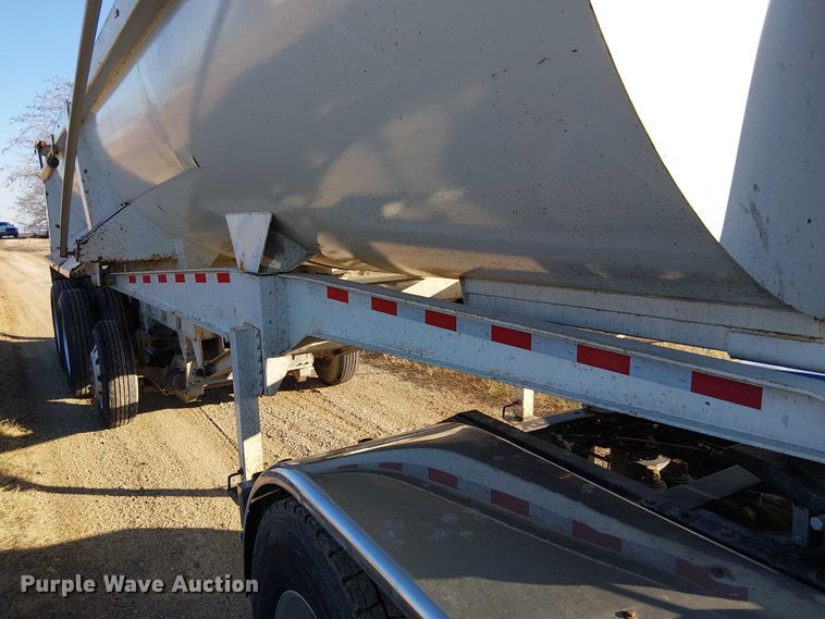 image for item FK0860 2021 Construction Trailer Specialists HRD 28 QF TRI end dump trailer
