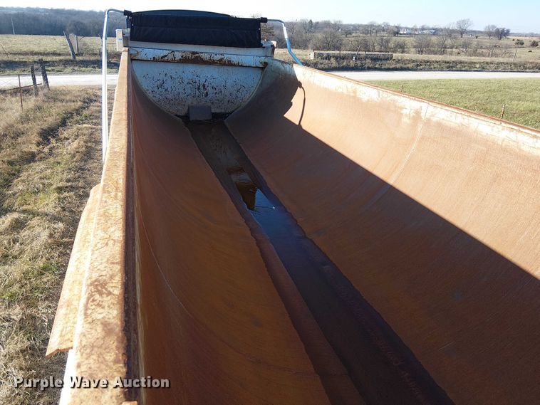 image for item FK0860 2021 Construction Trailer Specialists HRD 28 QF TRI end dump trailer