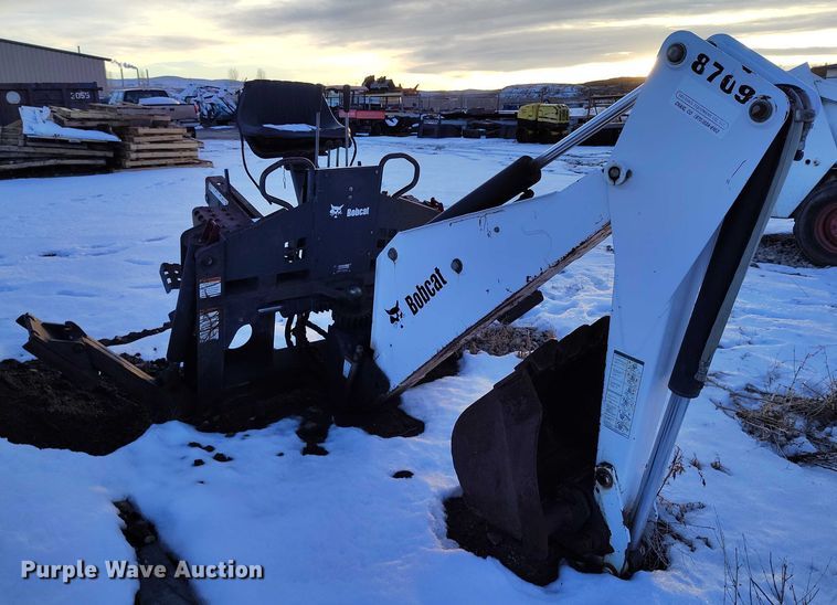 image for item IH9375 Bobcat 8709  skid steer backhoe attachment