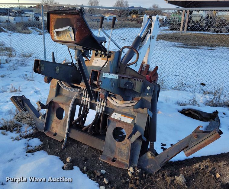 image for item IH9375 Bobcat 8709  skid steer backhoe attachment