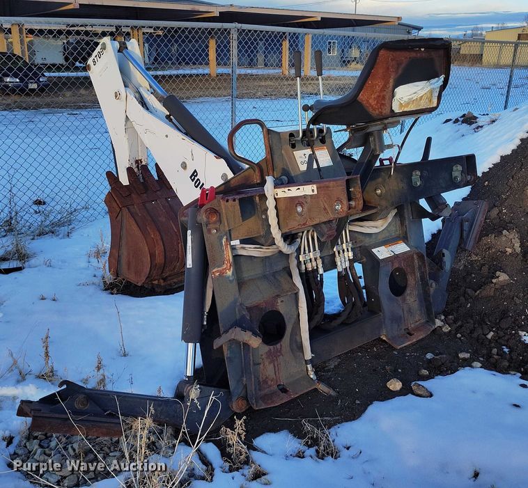 image for item IH9375 Bobcat 8709  skid steer backhoe attachment
