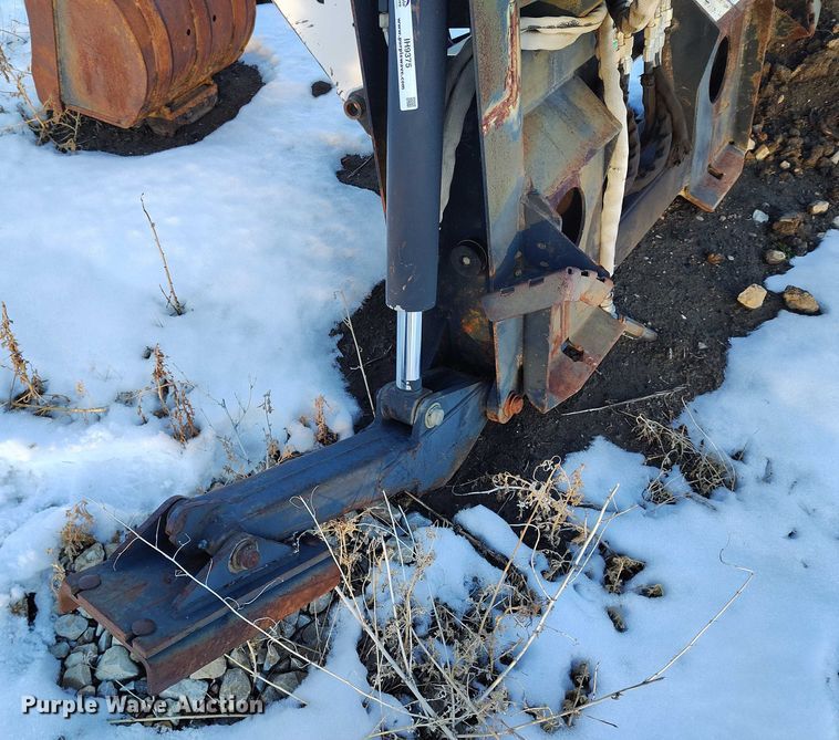 image for item IH9375 Bobcat 8709  skid steer backhoe attachment