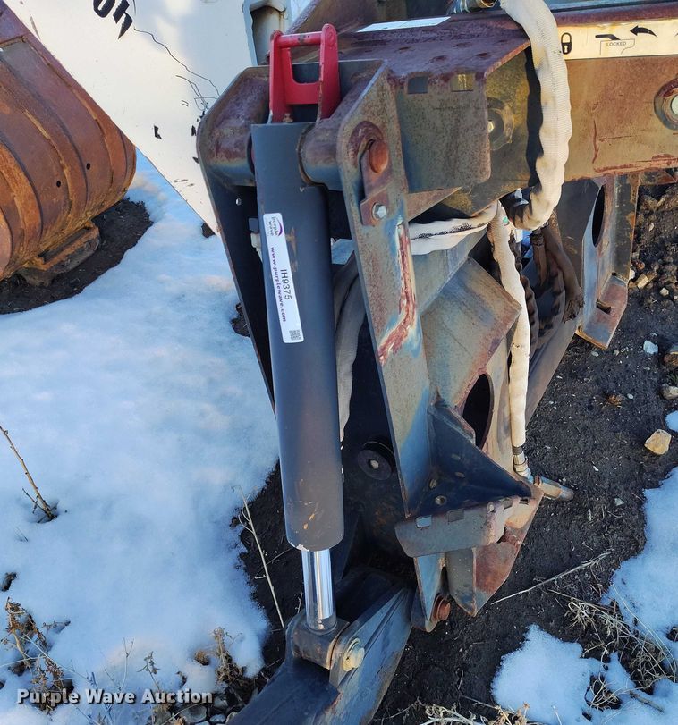 image for item IH9375 Bobcat 8709  skid steer backhoe attachment