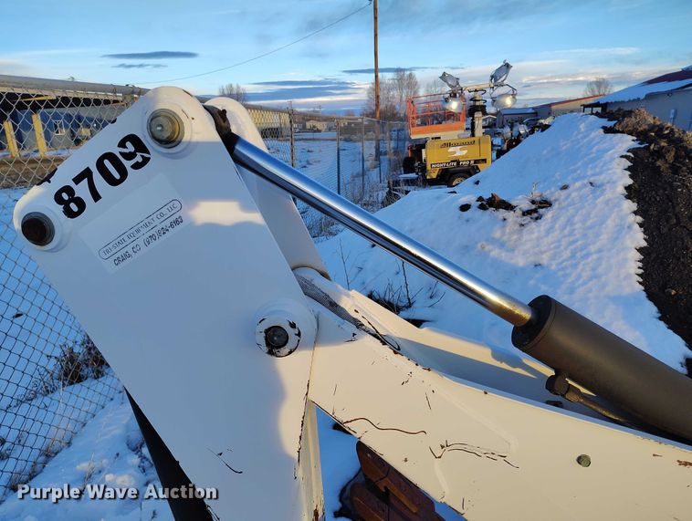 image for item IH9375 Bobcat 8709  skid steer backhoe attachment