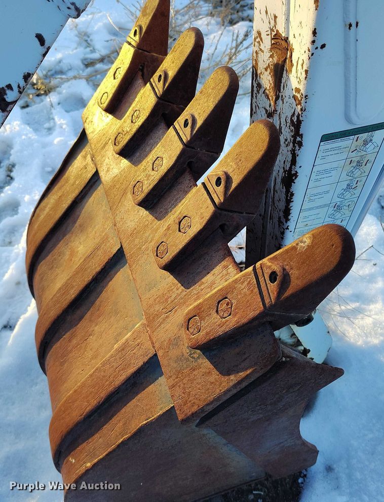 image for item IH9375 Bobcat 8709  skid steer backhoe attachment