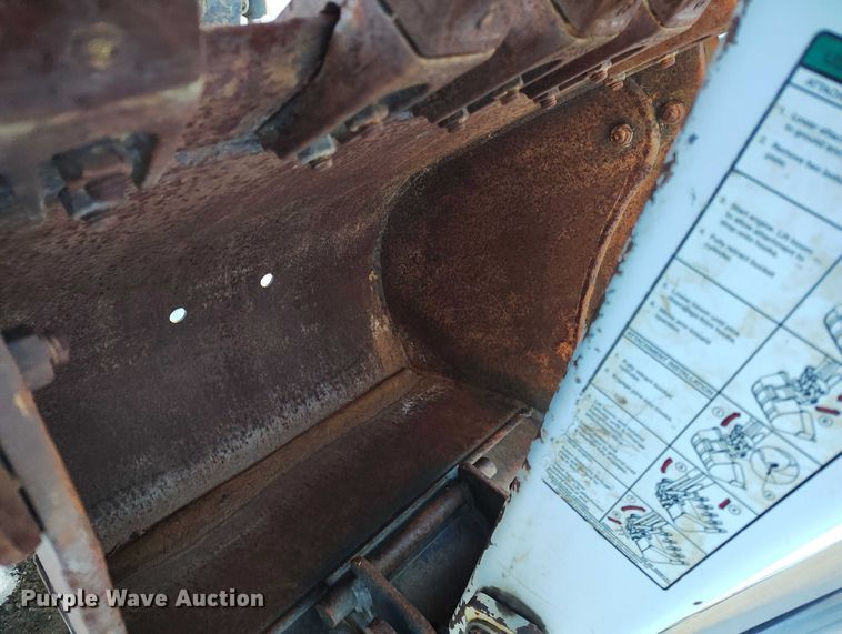 image for item IH9375 Bobcat 8709  skid steer backhoe attachment