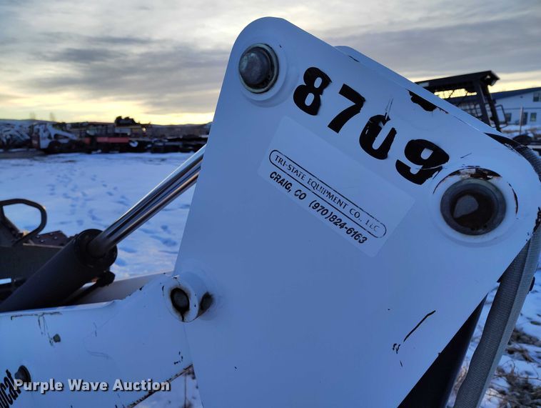 image for item IH9375 Bobcat 8709  skid steer backhoe attachment