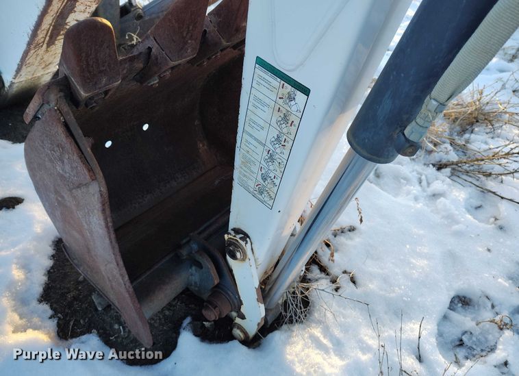 image for item IH9375 Bobcat 8709  skid steer backhoe attachment