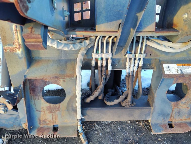 image for item IH9375 Bobcat 8709  skid steer backhoe attachment