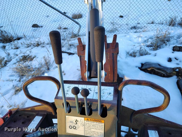 image for item IH9375 Bobcat 8709  skid steer backhoe attachment