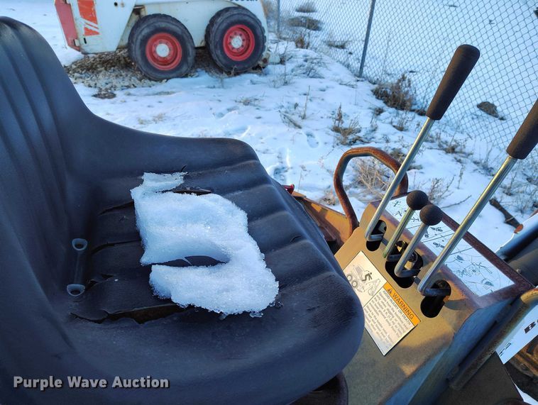 image for item IH9375 Bobcat 8709  skid steer backhoe attachment