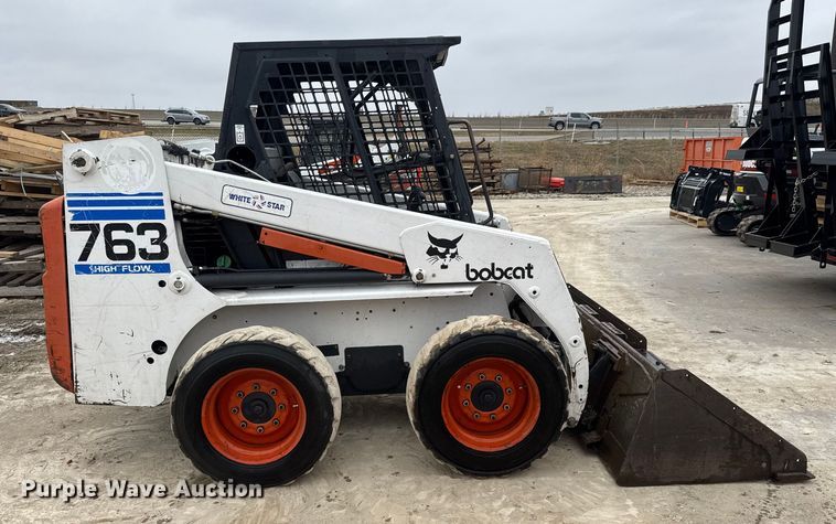 MINI CARGADOR SOBRE RUEDAS 1997 BOBCAT 763