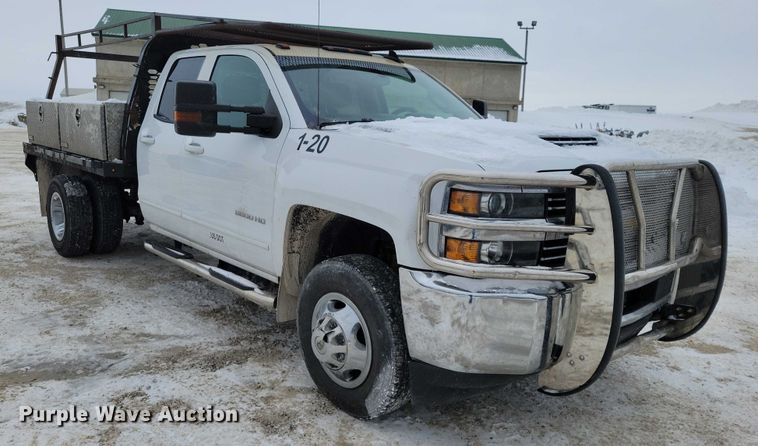 image for item NO9829 2017 Chevrolet Silverado 3500HD Double Cab flatbed pickup truck