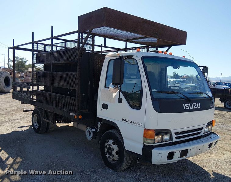 image for item EE5024 2005 Isuzu NPR flatbed truck