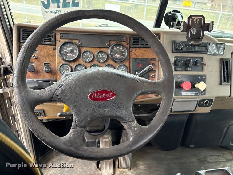 image for item EG8309 2004 Peterbilt 330 truck cab and chassis