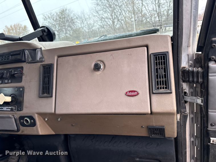 image for item EG8309 2004 Peterbilt 330 truck cab and chassis