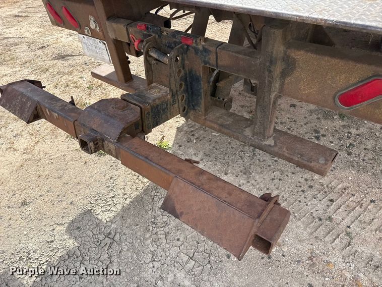 image for item EP0991 1998 Freightliner FL60 rollback truck