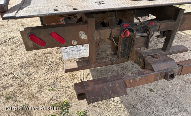 image for item EP0991 1998 Freightliner FL60 rollback truck