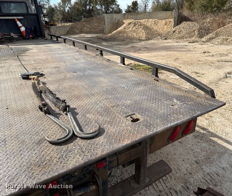 image for item EP0991 1998 Freightliner FL60 rollback truck