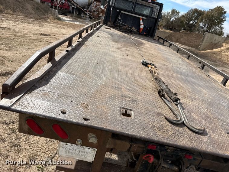 image for item EP0991 1998 Freightliner FL60 rollback truck