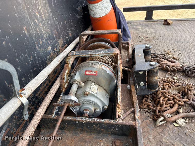 image for item EP0991 1998 Freightliner FL60 rollback truck