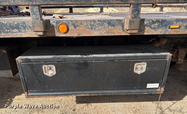 image for item EP0991 1998 Freightliner FL60 rollback truck