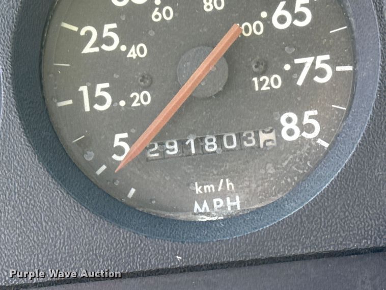 image for item EP0991 1998 Freightliner FL60 rollback truck