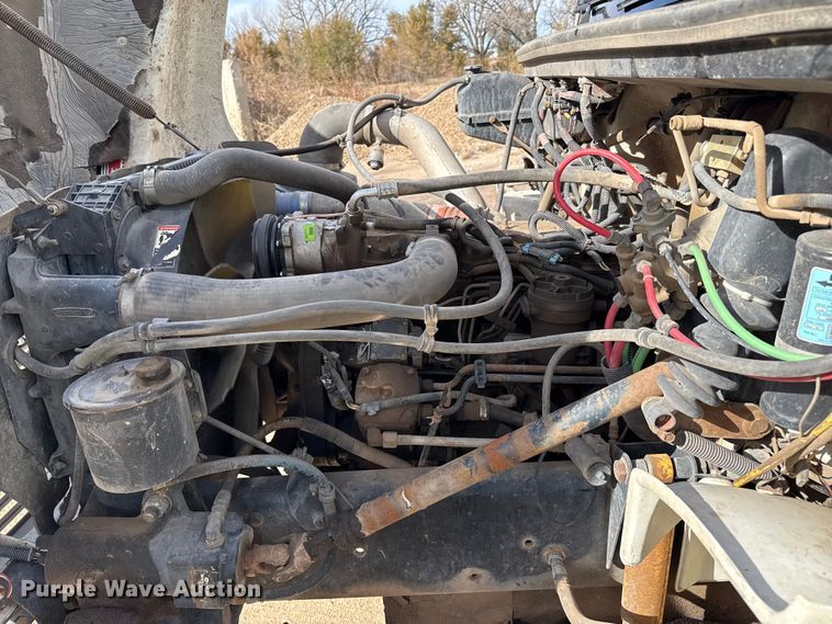 image for item EP0991 1998 Freightliner FL60 rollback truck