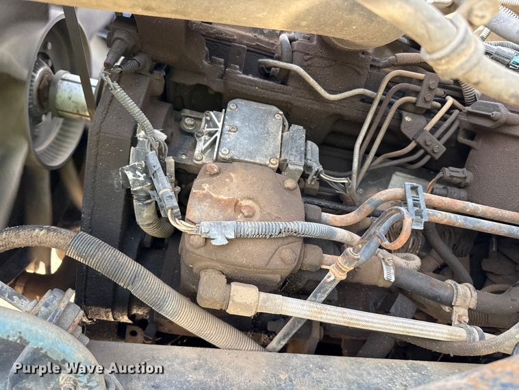 image for item EP0991 1998 Freightliner FL60 rollback truck